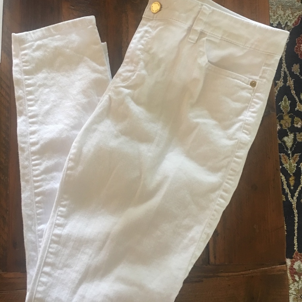 MK white skinny jeans.